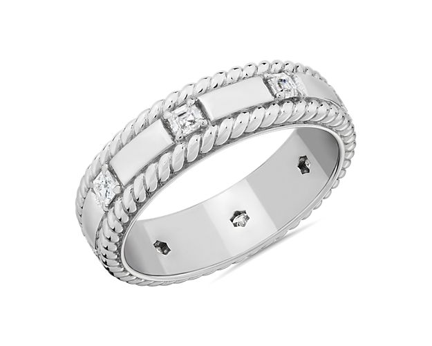 Brilliant princess-cut diamonds sparkle around this elegant wedding band, accented by artfully twisted texturing around the ring's edge. The gleaming platinum design promises enduring lustre.