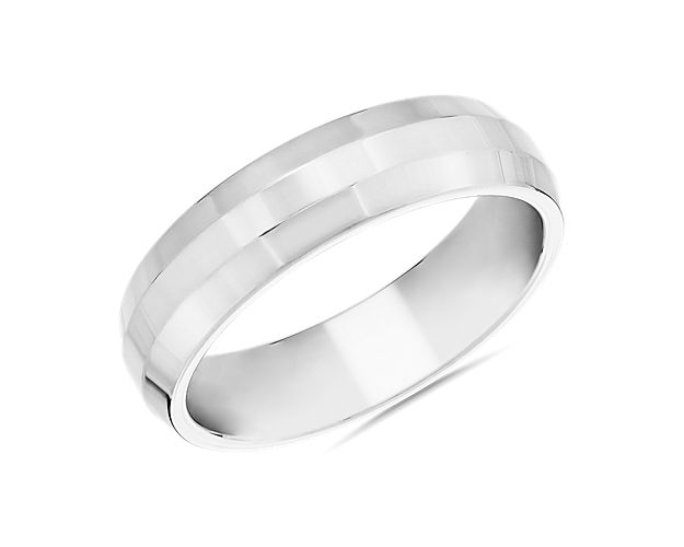 Slip on this elegantly simple Zac Posen plain band as a timeless expression of love. The beautifully crafted platinum design features a beveled edge for a hint of contemporary allure.