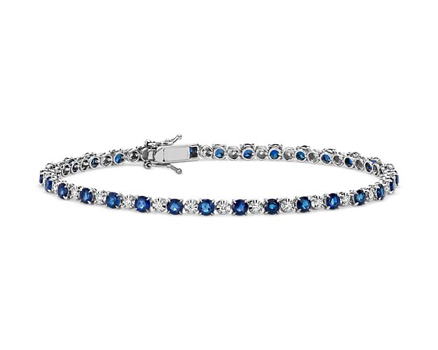 A classic tennis bracelet with a twist, this stunning piece features alternating prong-set sapphires and diamonds to give it substantial sparkle and incredible depth. Crafted from 14k white gold, this bracelet is secured by a subtle box catch.
