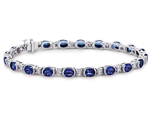 This standout sapphire and diamond bracelet adds a little color to the classic tennis bracelet. Twenty vibrant bezel-set blue sapphires, alternating with round brilliant prong-set diamonds, allows extra light in for more stunning color. A subtle box catch with hidden safety secures the bracelet.
