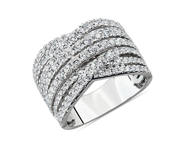Multi rows of round diamonds set in gleaming white gold delicately entwine to create this standout piece. Due to this ring's delicate nature, we do not recommend for daily wear and are unable to resize or repair.