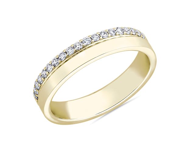 The modern embodiment of feminine and masculine style, this 14k yellow gold ring features a string of diamonds balanced by a parallel band of polished metal that looks good all on its own or in your go-to stack.