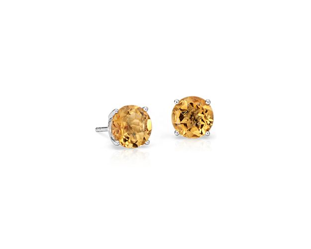 Delightfully colorful, these hand-selected gemstone earrings feature shimmering yellow citrine gemstones complemented by 14k white gold four-prong settings.