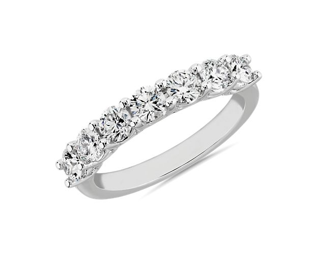 Embrace sparkling romance with this ring set with seven lab-grown diamonds that promises breath-taking brilliance. It features 14k white gold design, giving the low dome style a cool, enduring luster.