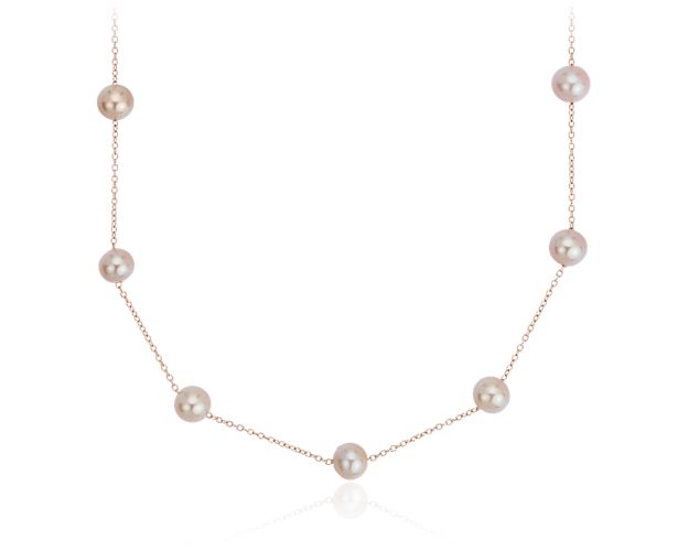 This "Tin Cup" pearl necklace, a style made famous by Rene Russo in the feature film of the same name, features lustrous pink freshwater cultured pearls stationed along a 14k rose gold cable chain. A delicate twist on a time-honored pearl necklace that makes a great first pearl purchase or a beautiful bridesmaid gift.