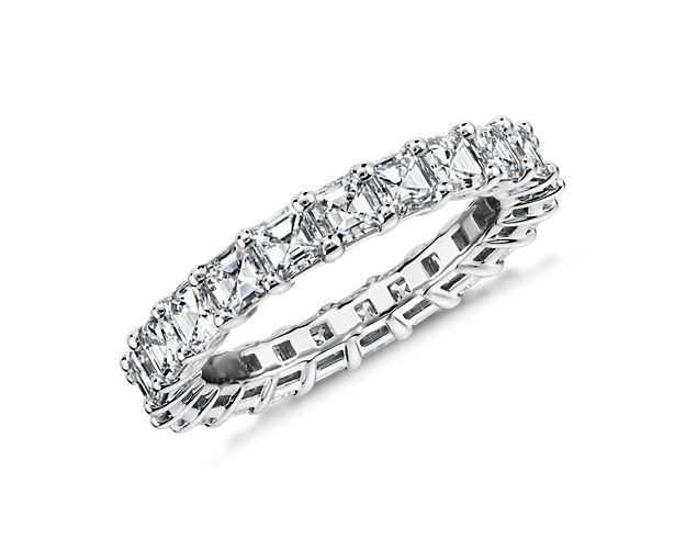 A dazzling circle of 3 ct. tw. Asscher-cut diamonds sets this stunning platinum eternity ring apart and makes it an ideal wedding ring or anniversary gift.