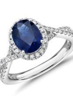 Oval Sapphire and Diamond Halo Twist Ring
